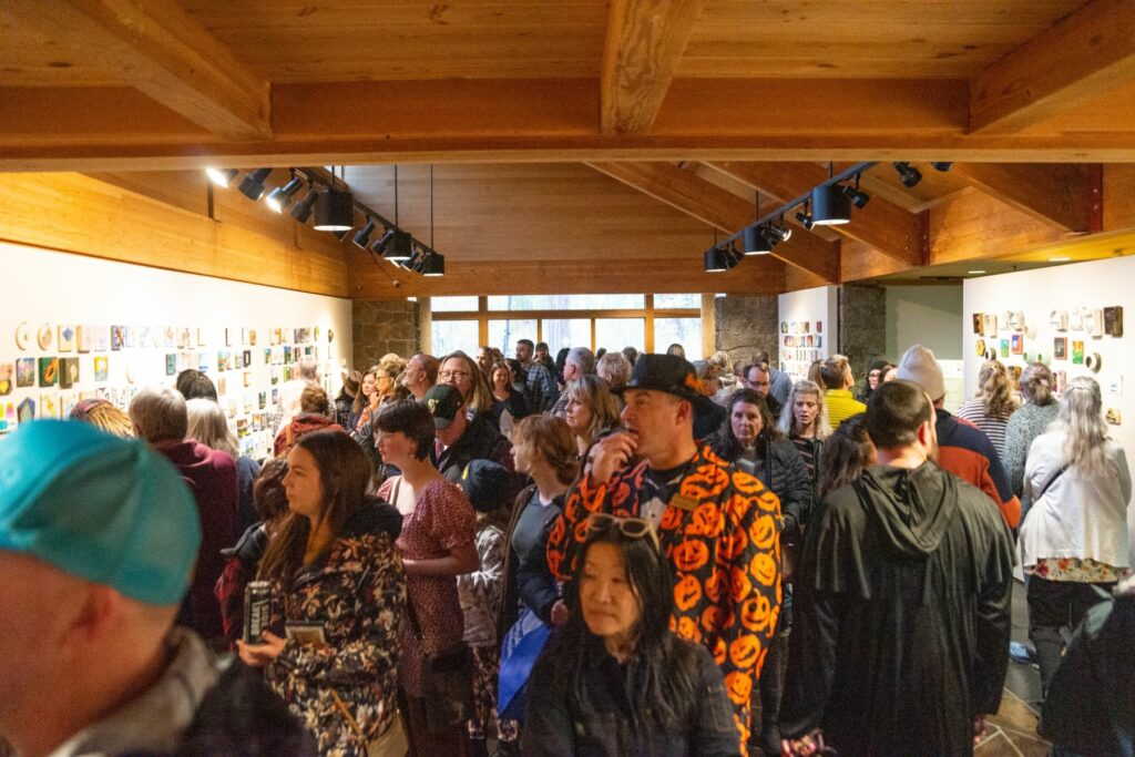 Crowds are the norm for opening night of the 20-Dollar Art Show, this year set for Oct. 23. The show continues through the weekend. Photo by: Amanda Long, courtesy of Bright Place Gallery