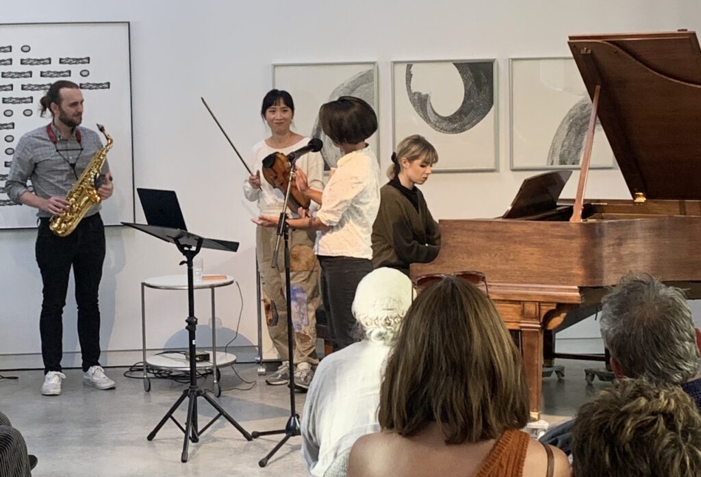 L to R: Will Pyle, Ling Ling Huang, Madeline Okano, and Ruta Marija Kuzmickas at Huang's Listening Lab with Third Angle New Music. Photo by Carissa Burkett.