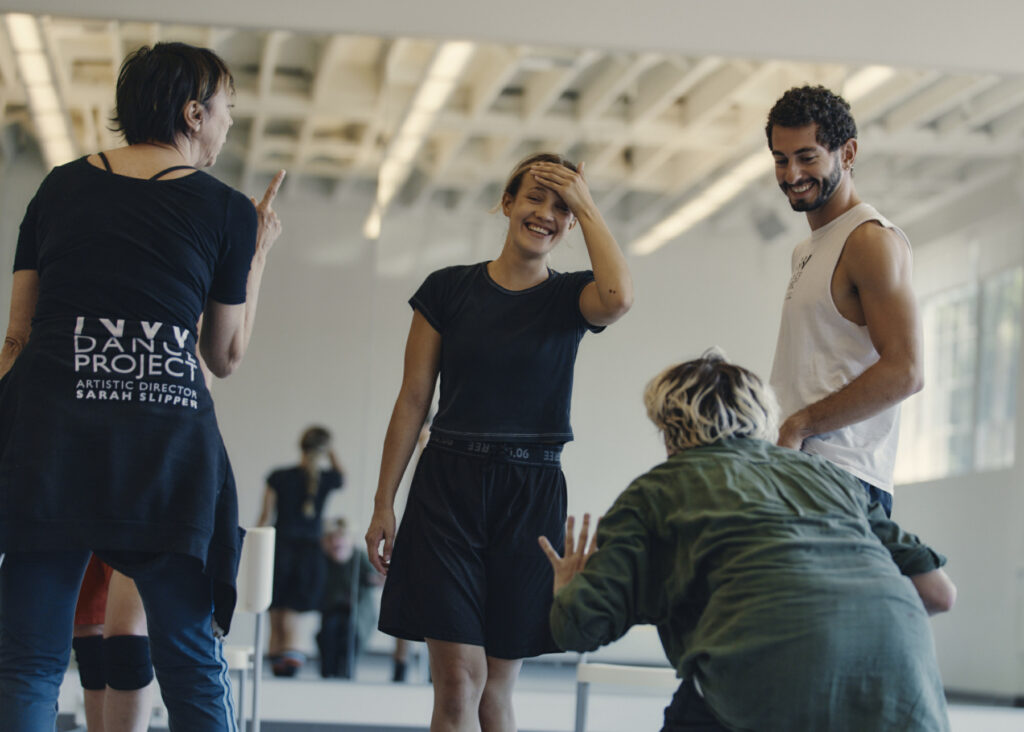 NW Dance Project choreographer Sarah Slipper, left, working in rehearsal with dancers Alejandra Preciado, Ingrid Ferdinand (crouching) and Anthony Milian on Slipper’s new dance “Another, Tomorrow.” Photo: Clayton Cotterell